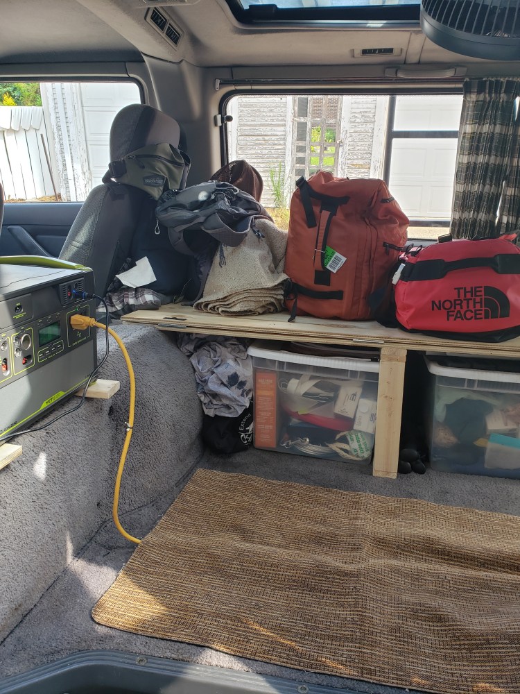 Interior of van with camping gear