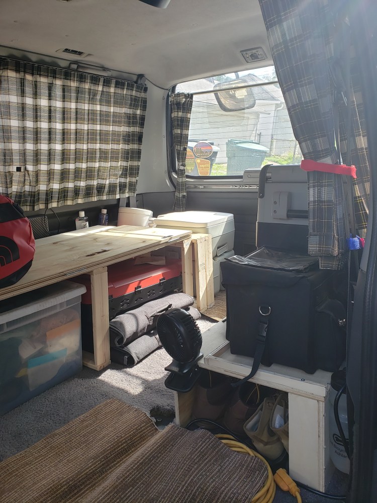 Interior of van with camping gear
