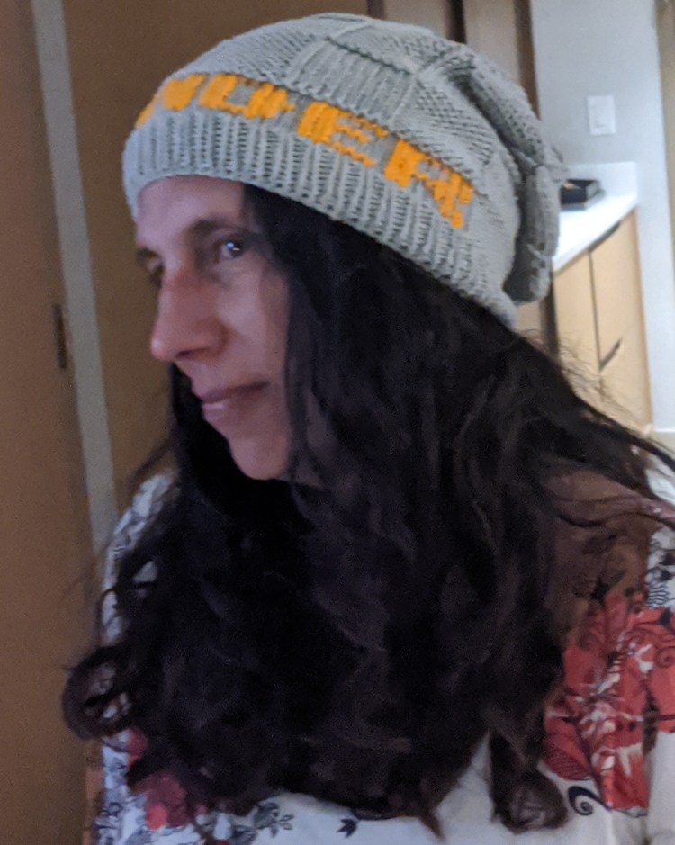 Wanderlyd wearing her Wander hat