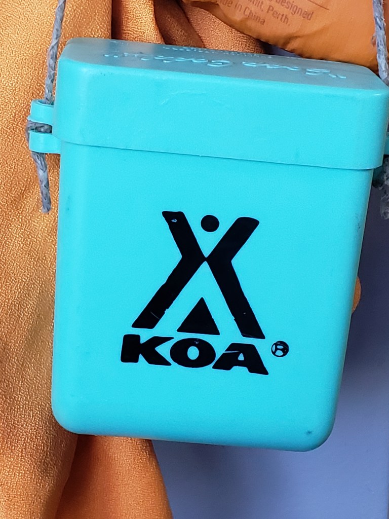blue soap caddy with KOA logo