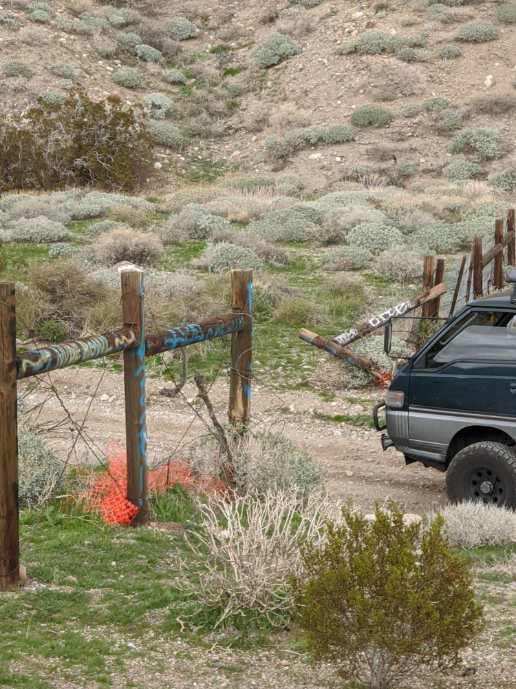 van pulling through gate to Nude Bowl