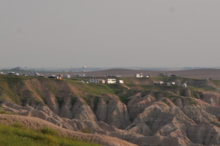 vehicles camped along the ridge